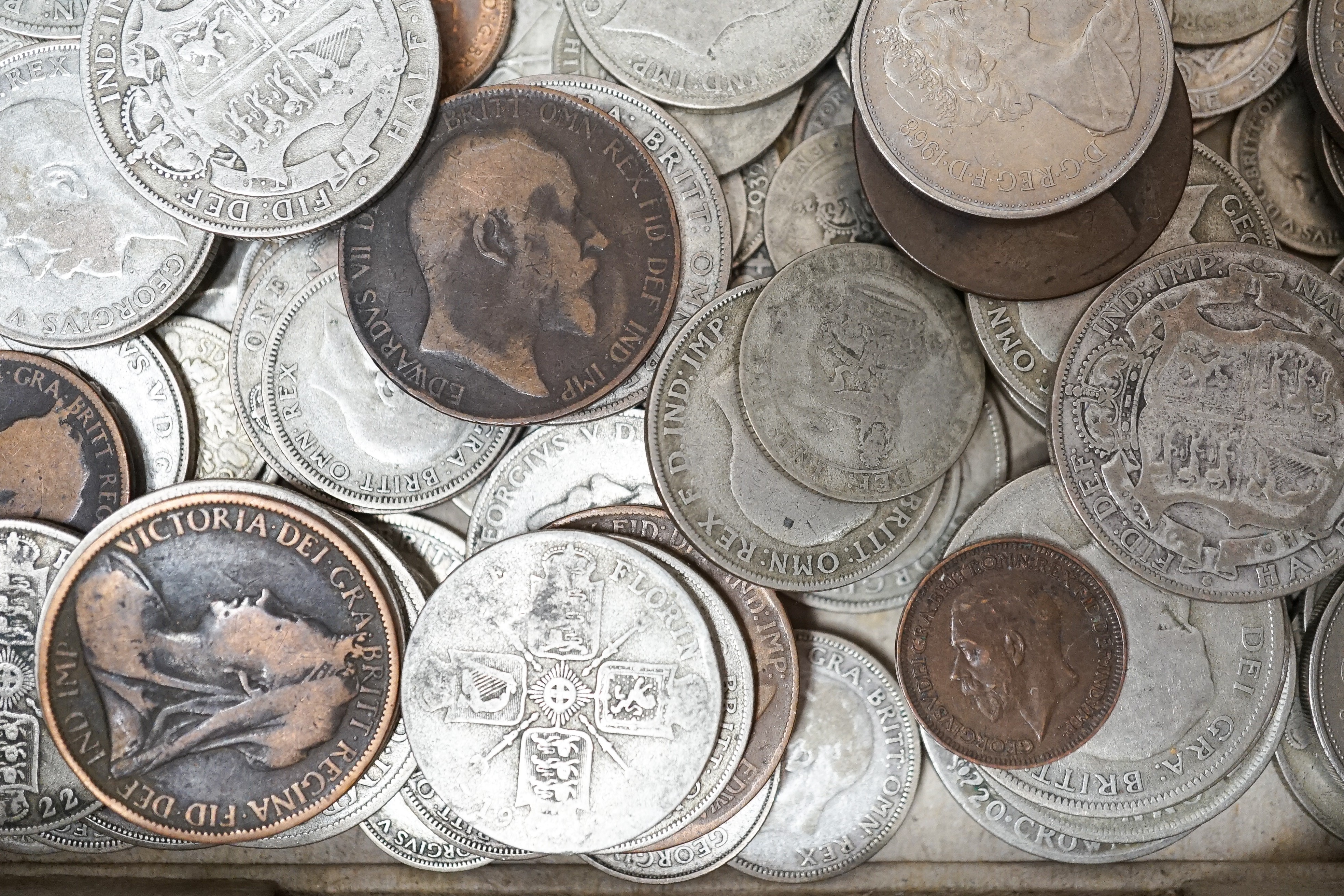 A group of 19th/20th century UK and World coins including florins and crowns